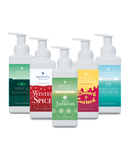 Scented Hand Foam Sanitiser Multi Pack with five refillable foaming bottles in various fragrances, including Wild Jasmine, Mint and Eucalyptus, Rhubarb & Custard, Seagrass & White Lotus, and Winter Spice.